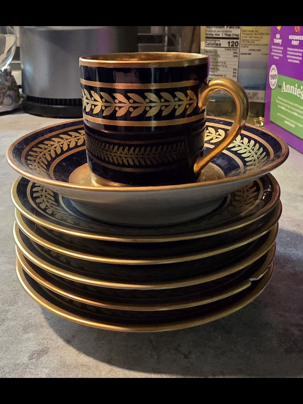 Bernardaud Deep Navy Porcelain Cup and Saucer Set with Gold Leaf Trim